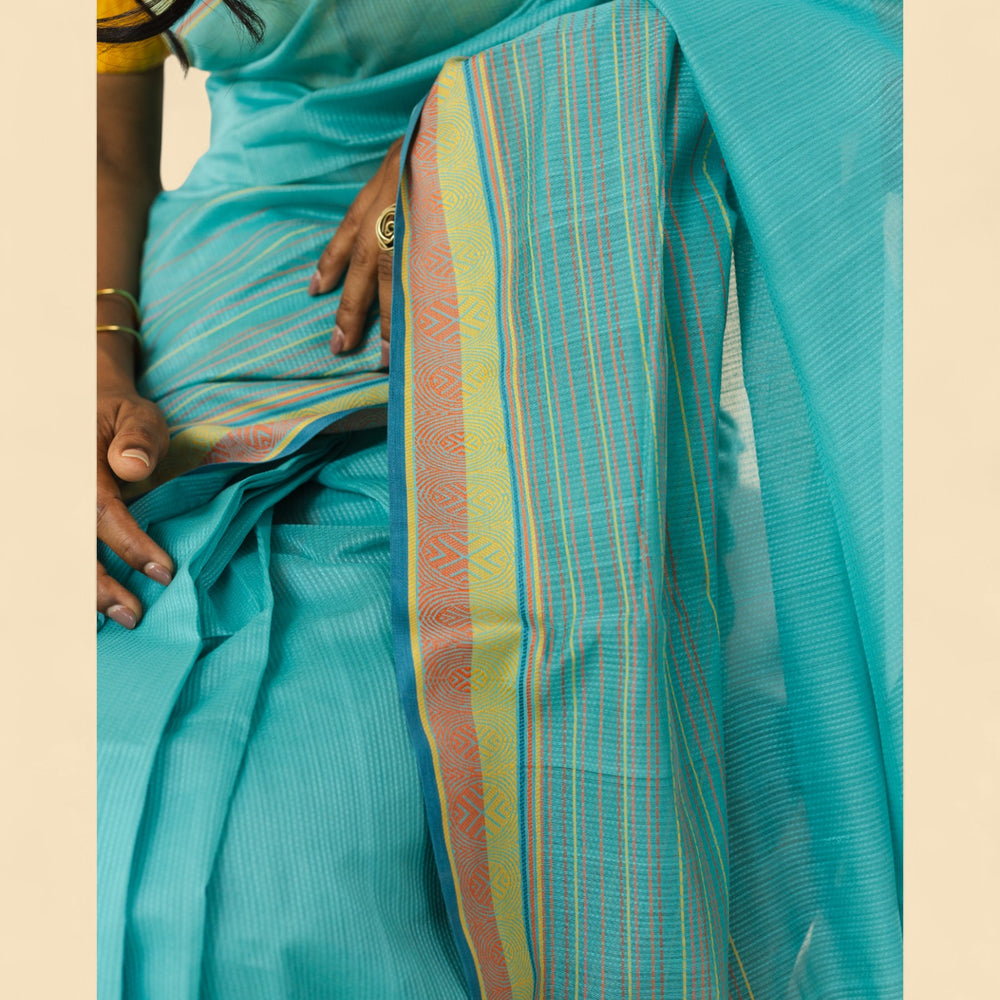 
                      
                        Cyan Blue - Whispering Circles Organic Cotton Saree
                      
                    