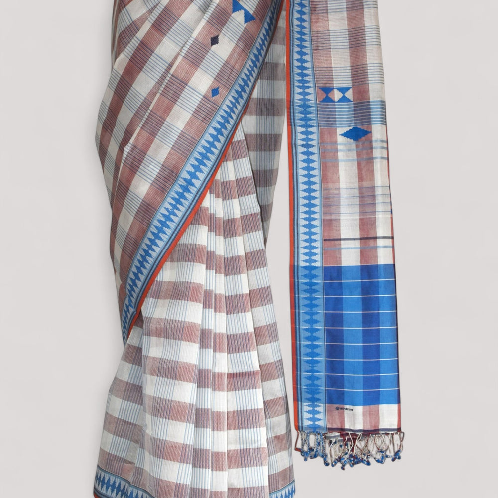 
                      
                        Brown & Blue - Korvai & Buttas Organic Cotton Saree
                      
                    