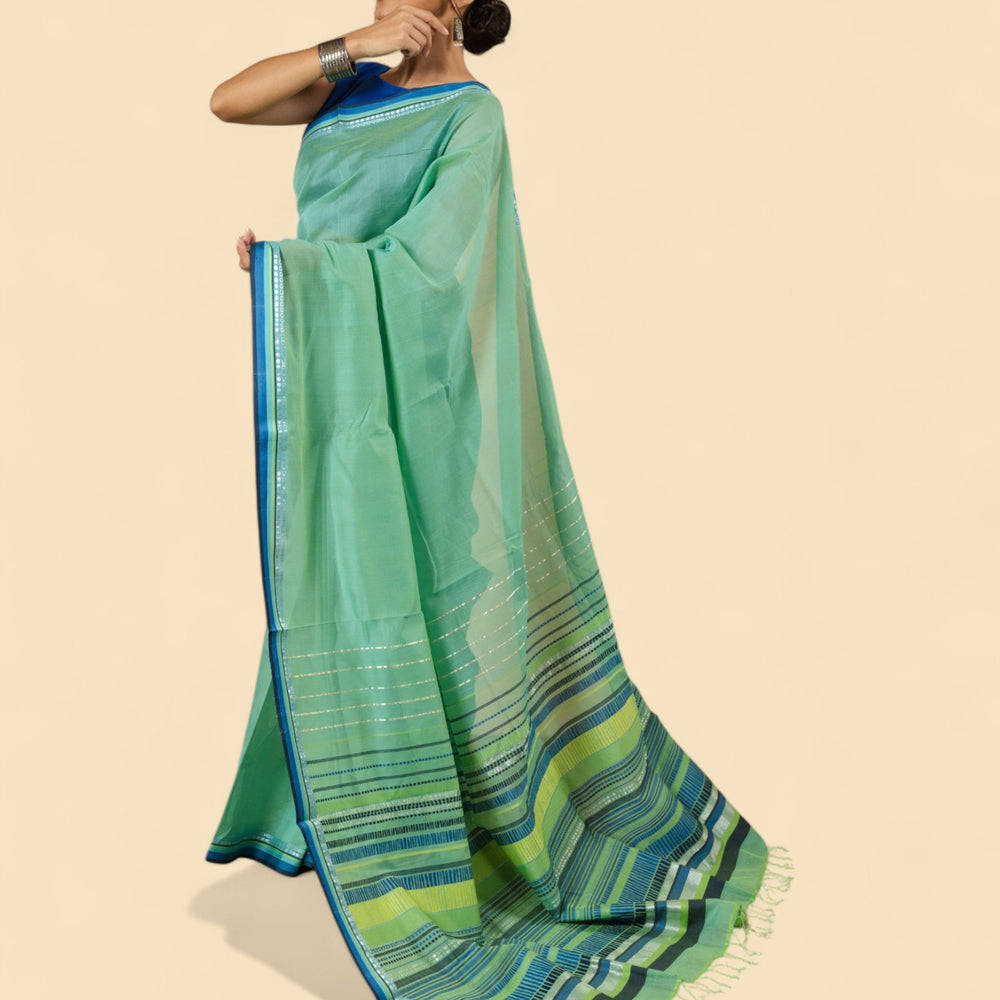 
                      
                        Sea Green - Dots and Dashes Organic Cotton Saree
                      
                    